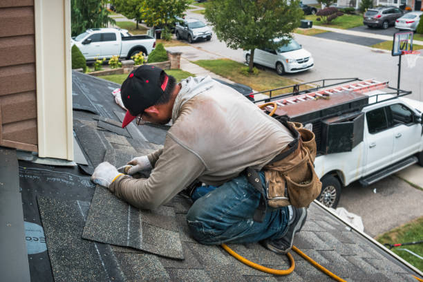 Professional Roofing technician working in Riverside, ID
